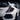16 - 21 Honda Civic 10th Hatchback Digital LED Tail Lights Assembly With Sequential Turn SignalTail LightsClose - up focusing on the custom digital tail light of a white 10th - gen Honda Civic hatchback. The aftermarket assembly features a smoked angular housing containing a distinctive purple pixelated LED ring. A sharp amber LED turn signal strip sits above the digital circle, with a white reverse light bar beneath it. The glowing, futuristic light pattern contrasts vividly against the vehicle