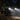 Jeep Wrangler TJ JK black LED projector headlights with high beam in a night forest | SKU: HY-LED-254B
