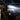 Chevrolet Silverado triple projector LED headlights with bright beam in rain at night | SKU: FLT1-1003-1