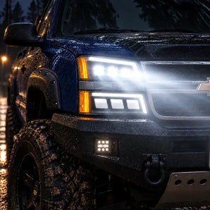 Chevrolet Silverado triple projector LED headlights with bright beam in rain at night | SKU: FLT1-1003-1
