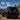 2009-2012 Toyota RAV4 Smoked Red LED Tail Lights – Low Angle Trail Dust Off-Road Scene