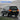 2008–2015 Toyota Land Cruiser with illuminated PRISMBEAM LED tail lights driving through falling snow.