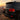 Toyota LC200 2016-2021 Land Cruiser with illuminated smoked LED tail lights at a rocky mountain overlook during sunset.