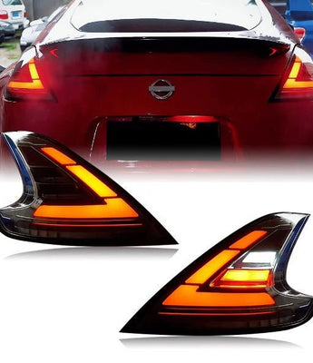 Nissan 370z Z34 tail lights 2008 - 2019 - Pair (Left+Right) - PrismBeamNissan 370z Z34 tail lights 2008 - 2019 - Pair (Left+Right)NissanPrismBeamPrismBeamJM-43-SSmoked red StripesNissan 370z Z34 tail lights 2008 - 2019 - Pair (Left+Right)