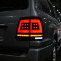 1998-2007 Toyota Land Cruiser 100 Smoked White LED Tail Lights Assembly With Sequential Turn Signal