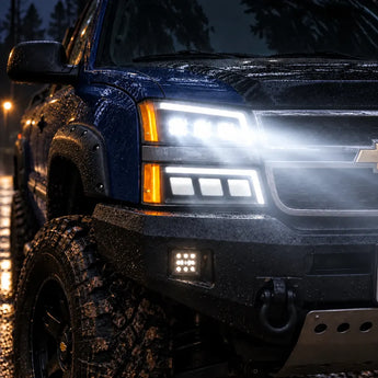 Chevrolet Silverado triple projector LED headlights with bright beam in rain at night | SKU: FLT1-1003-1
