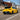 2019-2026 Toyota Corolla Hatchback & 2023-2026 GR Corolla Smoked White LED Tail Lights Assembly With Sequential Turn Signal yellow corolla running on the road
