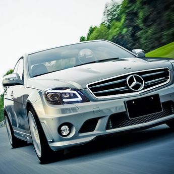 Benz C-class W204 LED headlights light effect in a car on road