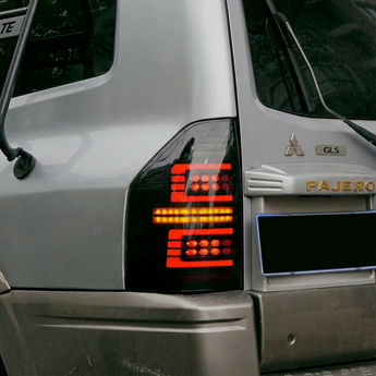 PrismBeam | 2009-2022 Mitsubishi Pajero V73 Smoked LED Tail Lights Set