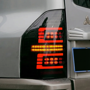 PrismBeam | 2009-2022 Mitsubishi Pajero V73 Smoked LED Tail Lights Set