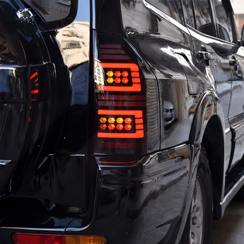 PrismBeam | 2009-2022 Mitsubishi Pajero V73 Smoked LED Tail Lights Set