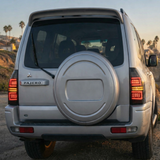 PrismBeam | 2009-2022 Mitsubishi Pajero V73 Smoked LED Tail Lights Set