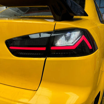 Mitsubishi Lancer/evo 08 - 18 RGB Tail Lights - 30 Digital Patterns - Pair (Left+Right) - PrismBeamMitsubishi Lancer/evo 08 - 18 RGB Tail Lights - 30 Digital Patterns - Pair (Left+Right)MitsubishiPrismBeamPrismBeam638-Ddigital blinking eye for Lancer/evo from prismbeam